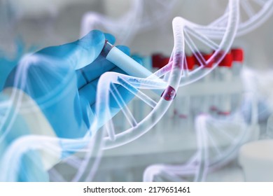 Scientist With Tube And Virtual Screen With Data Scientific At Genetic Engineering Lab. Biomedical Engineer Genetic Working With Tubes In Biotechnical Laboratory