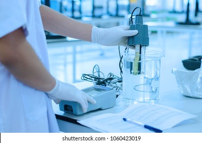 Scientist Used Chemical Solution And Lab Testing For Water Quality Or Ph Meter In Laboratory ,research And Science Concept