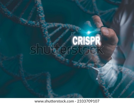 Scientist using pen touch icon CRISPR, genetically modified DNA, blue background concept in artificial intelligence. development of genetically modified human genes
