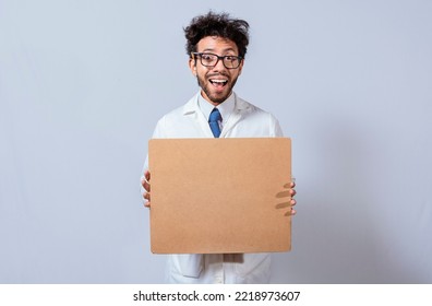 A Scientist In A White Coat Is Holding And Showing A Blank Clipboard. Scientist Showing And Pointing At A Blank Clipboard, Professor In White Coat Holding And Showing A Blank Clipboard Isolated