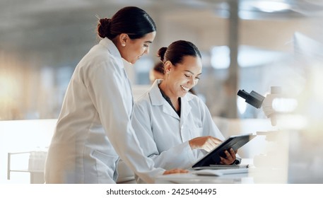 Scientist, women and teamwork on tablet and computer for laboratory advice, medical research and night planning. Students, science people or mentor on digital technology of test results or comparison - Powered by Shutterstock