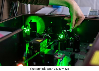 scientist work with laser machine or system