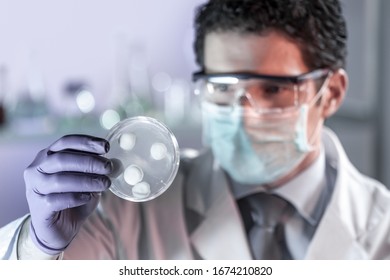 Scientist Working In The Corona Virus Vaccine Development Laboratory Research Facility. Corona Virus Pandemic Concept. Development Of Virus Treatment Drug.