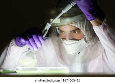 Scientist Working In The Corona Virus Vaccine Development Laboratory Research Facility. Corona Virus Pandemic Concept. Development Of Virus Treatment Drug.