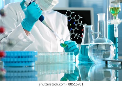 scientist working at the laboratory. Screen image of molecule made by myself - Powered by Shutterstock