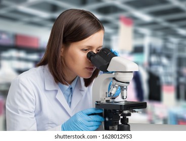 Scientist working with microscope in lab. Laboratory research concept - Shutterstock ID 1628012953