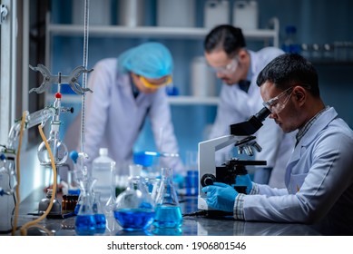 Scientist Working With Microscope In Laboratory, Medical Science Research