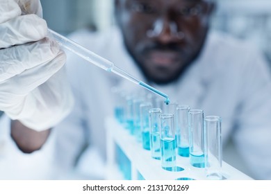 Scientist Working With Samples In Tube