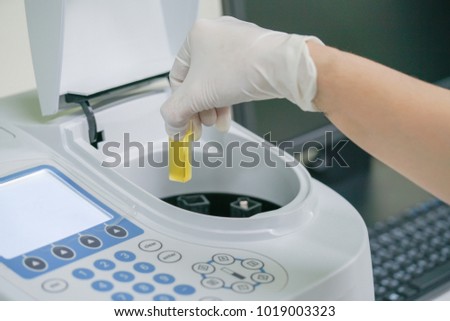 Scientist working at water quality test  use by Spectrophotometer in the laboratory