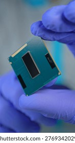Scientists and engineer shows CPU Central Processing Unit in the hand. Concept of AI boom triggered a massive shortage of CPUs, driving prices high as tech giants hoard components for data centers