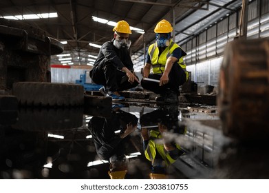Scientists and government officials Inspect and collect chemical leak samples in industrial sites. to be thoroughly investigated in the laboratory - Shutterstock ID 2303810755