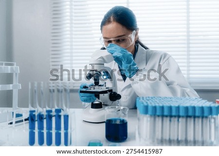 Scientists perform biochemical experiments in a lab for health care solutions