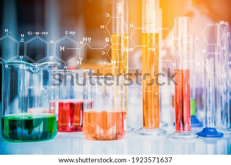 Scientists are preparing test tubes containing a large number of chemical and chemical structural formulas in the Science Laboratory to research antiretroviral drugs, a future world maintenance idea.