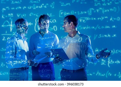 Scientists with projected mathematical data