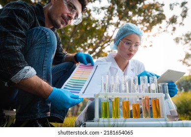 Scientists Team Collect Water Samples For Analysis And Research On Water Quality, Environment With Saving Earth.