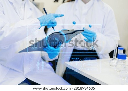 Scientists using AI technology in a modern laboratory to advance biotechnology, medical research, precision diagnostics 