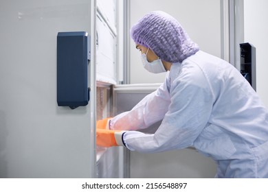 Scientists work in the laboratory. Remove the biomaterial from the freezer - Powered by Shutterstock