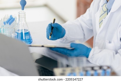 Scientists Work With In Vitro Reagents In Laboratories And Draw Conclusions From Their Research.