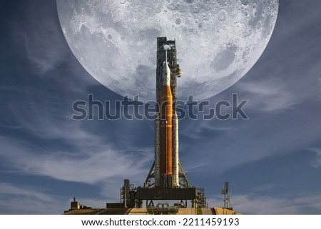 Sci-fi concept with Orion spacecraft and big Moon on background. Artemis space program to research solar system. Mission to the Moon. Elements of this image furnished by NASA.