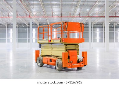 Scissor Lift Aerial Work Platform At A Construction Site.