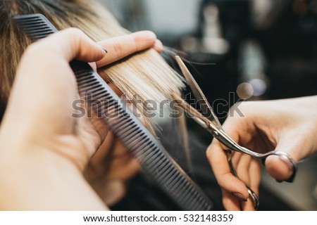 Scissors cut the girls hair