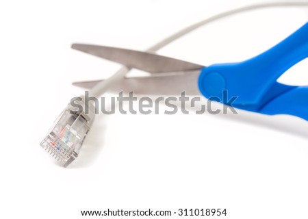 Scissors cutting CAT5E interner cable isolated on white background