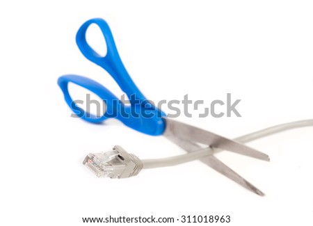 Scissors cutting CAT5E interner cable isolated on white background