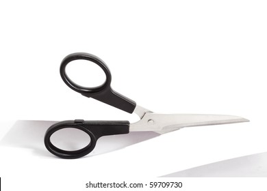 Scissors Cutting A Paper