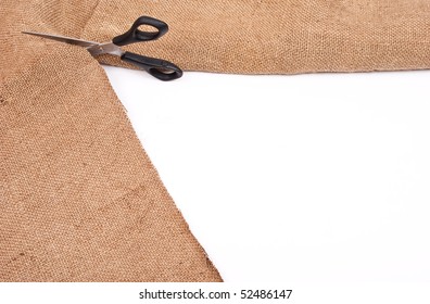  Scissors cutting sackcloth material