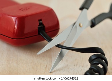 Scissors Cutting Telephone Cord - Concept Of Landline Phone