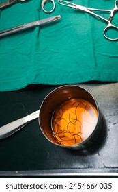 Scissors, knives, needles and thread that are germ-free used for surgery