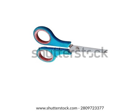 scissors on radiant white background 