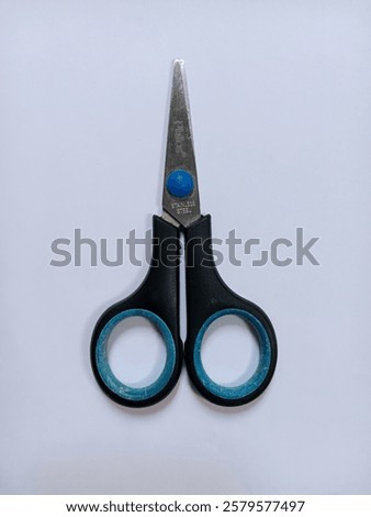 A scissors on a white background 