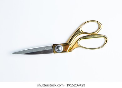 Scissors On White Paper Background