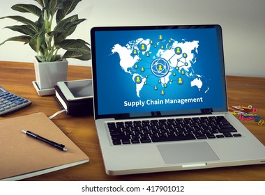 SCM Supply Chain Management concept Laptop on table. Warm tone