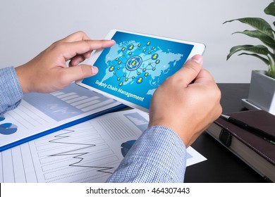 SCM Supply Chain Management Concept  Man Using Tablet Computer, Marketing Data Paper3