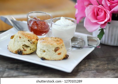 Scone Or Raisin Scone With Strawberry Sauce