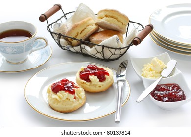 Scone With Strawberry Jam And Clotted Cream , Afternoon Tea Break , Cream Tea , Tea Party , Buttermilk Biscuits