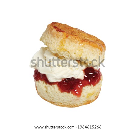 Scone with strawberry jam and fresh cream, isolated on white background 