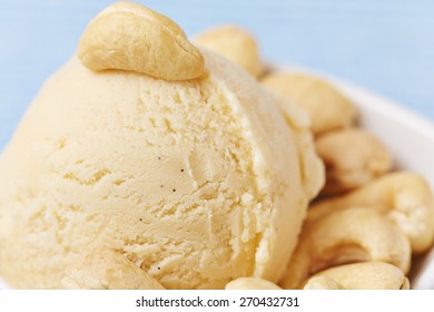 Scoop Of Cashew Ice Cream With Many Cashew Nuts