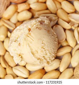 Scoop Of Peanut Butter Ice Cream With Peanuts From Above