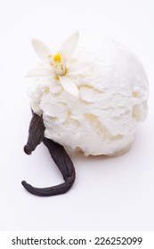 A Scoop Of Vanilla Ice Cream With A Vanilla Bean Isolated On White Background