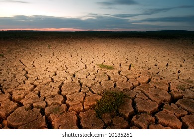 Scorched Earth With Sunset Sky