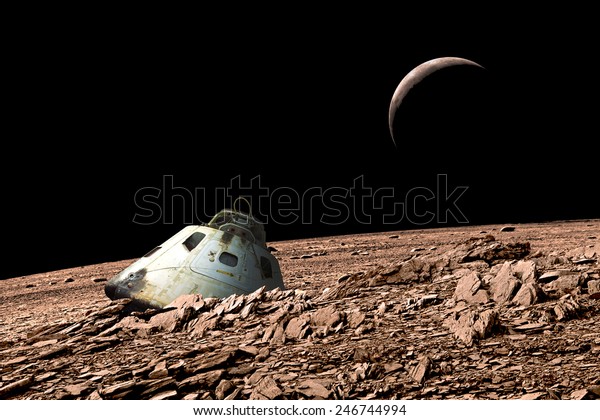A scorched\
space capsule lies abandoned on a barren and airless moon. -\
Elements of this image furnished by\
NASA.