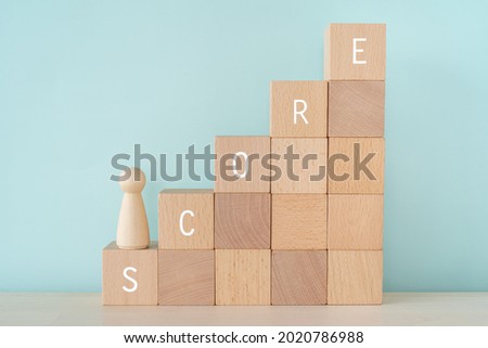 SCORE; Wooden blocks with 