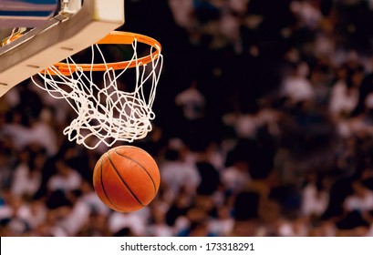 Scoring the winning points at a basketball game - Powered by Shutterstock