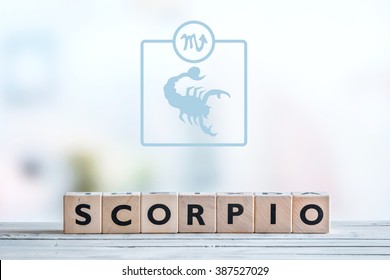 Scorpio Star Sign On A Wooden Table