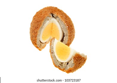 Scotch Egg With A Section Cut Out Isolated Against White