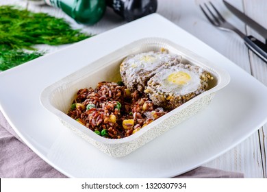 Scotch Eggs With Beef And Brown Rice, Prepared Frozen Meal, Container Tv Dinner. Microwave Meals Ready To Heat Up