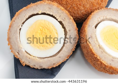 Scotch eggs a hard boiled egg wrapped in pork sausage meat and breadcrumbs